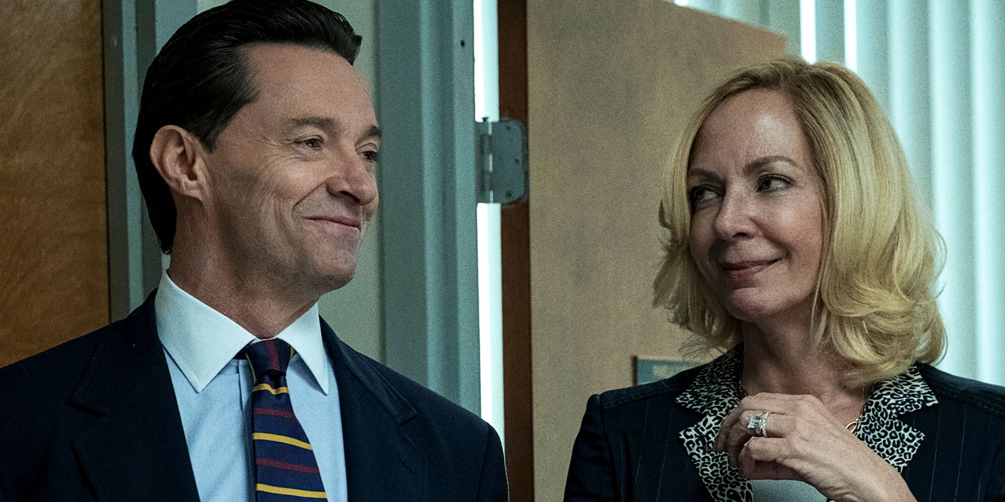 Hugh Jackman and Allison Janney smile at each other in Bad Education