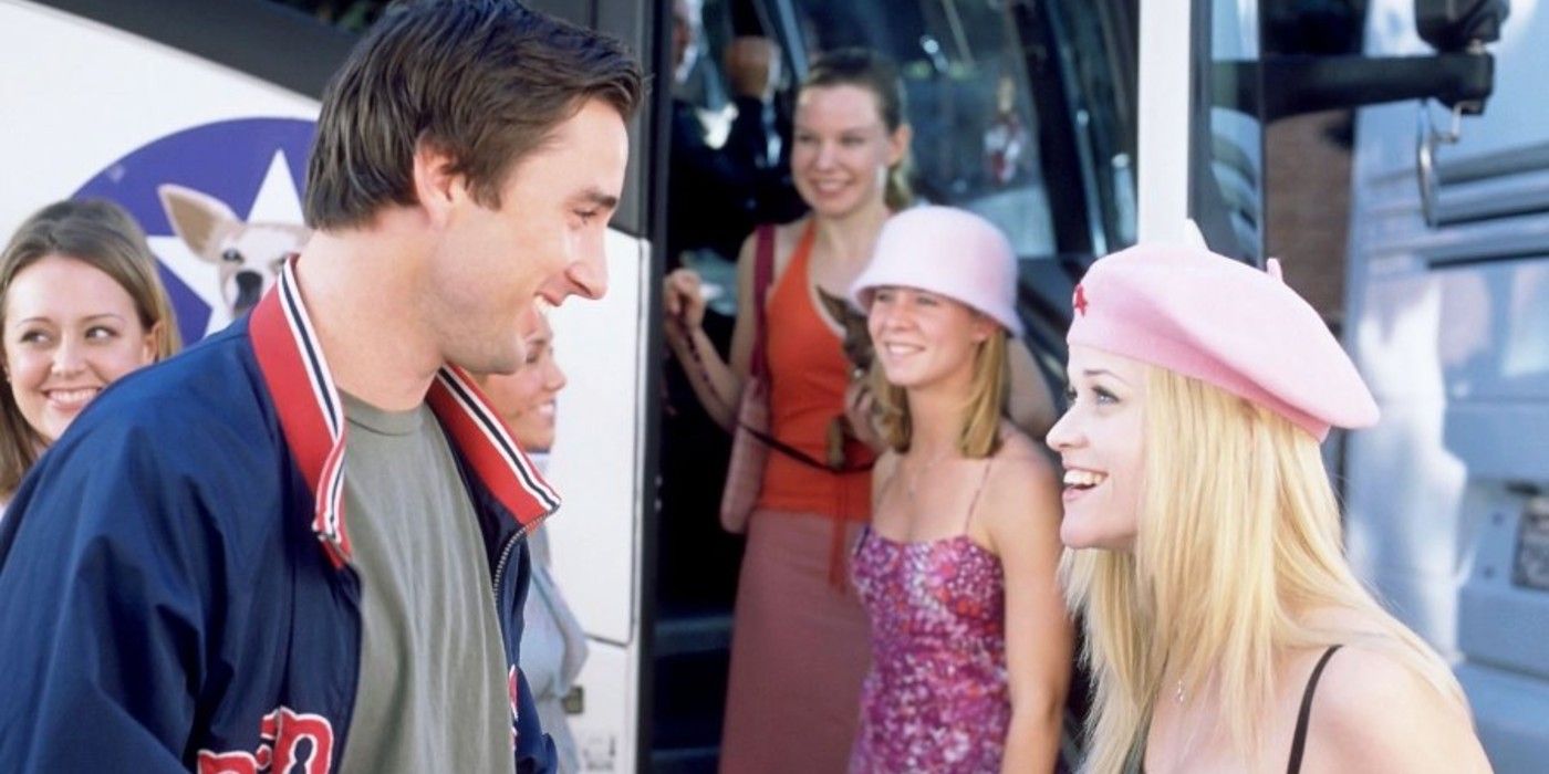 Luke Wilson and Reese Witherspoon smiling at one another in a promotional image from Legally Blonde 2.