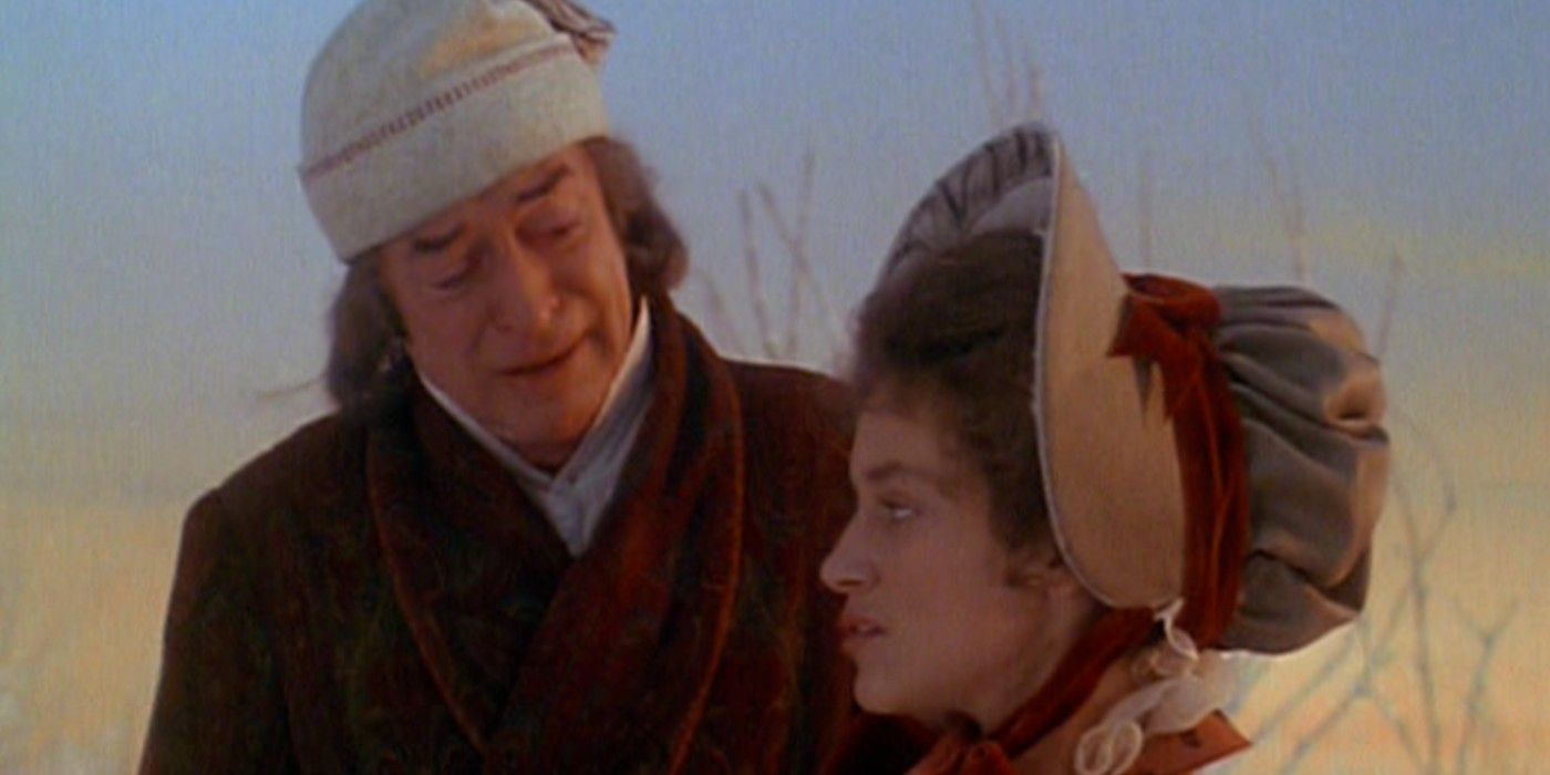 Belle and Scrooge in Muppet Christmas Carol