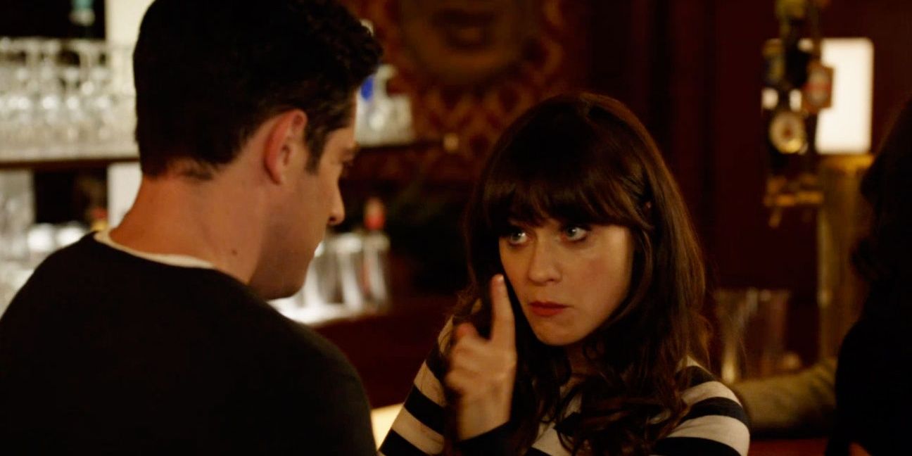 Jess chastises Schmidt at the bar in New Girl