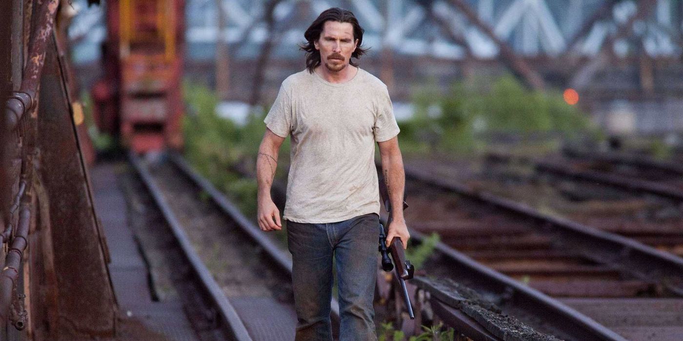 Christian Bale walking in Out of the Furnace