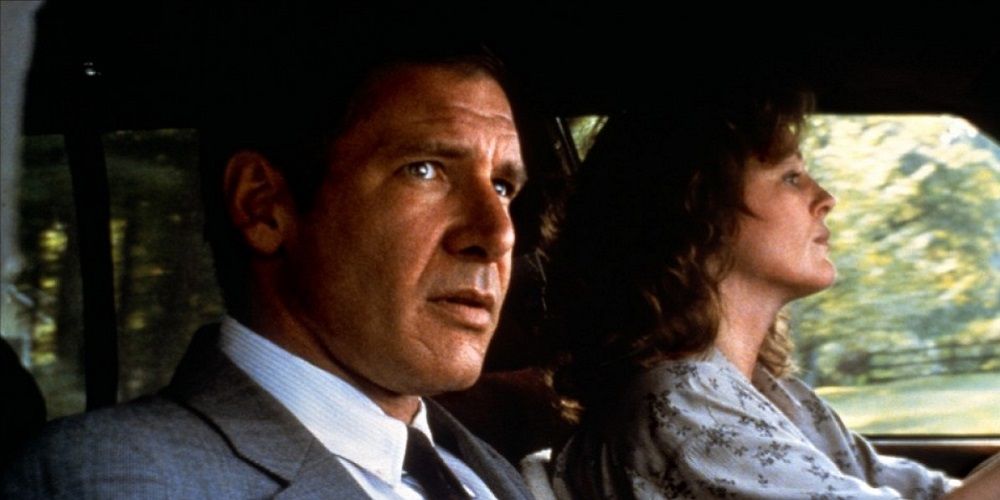 Rozat in a car with a woman in Presumed Innocent