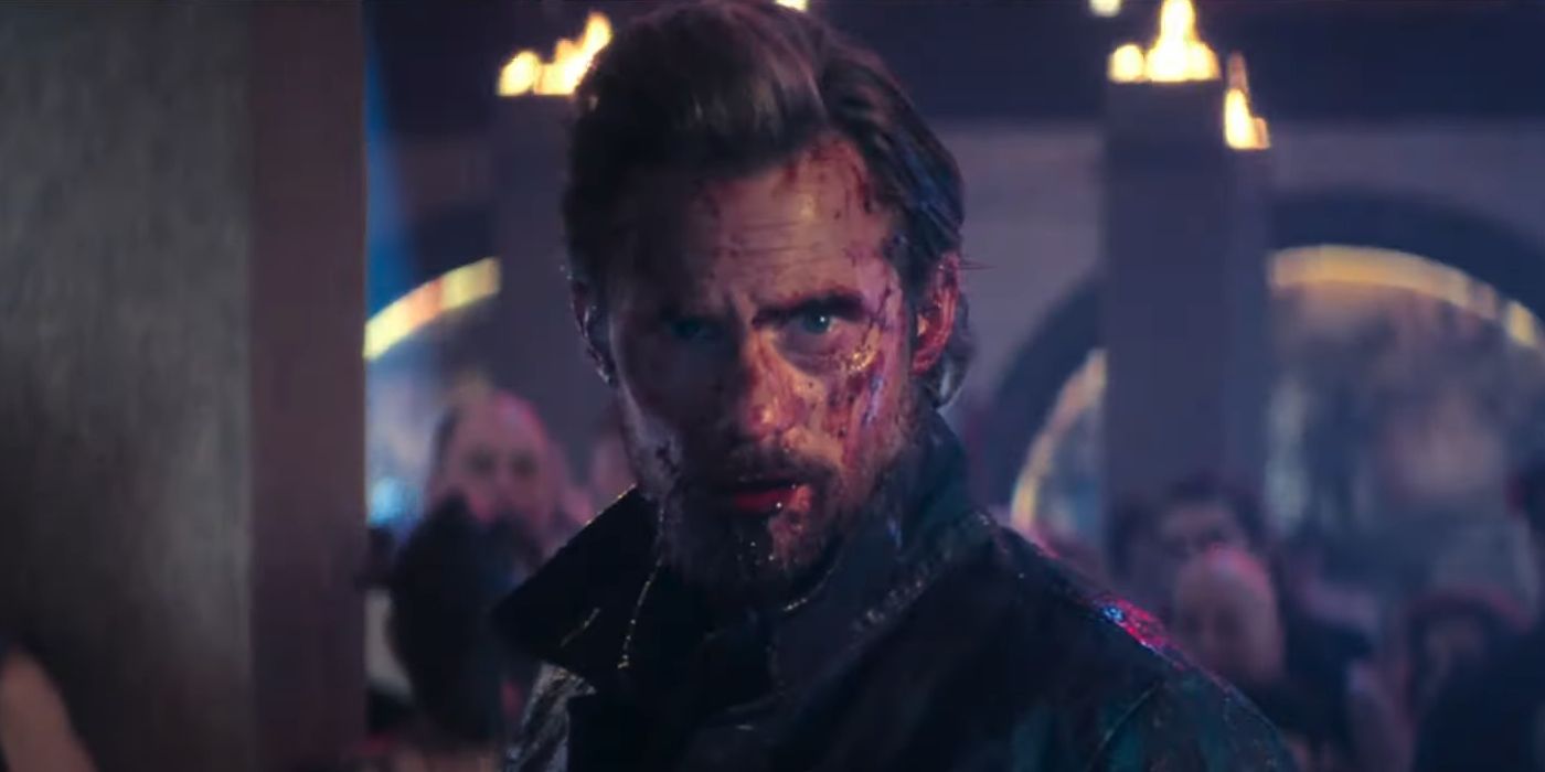 Alexander Skarsgard as Randall Flagg in The Stand 2020 with a bloody face.