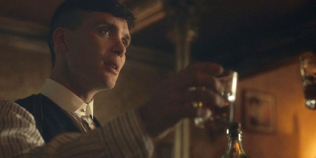 Tommy Shelby drinking gin in Peaky Blinders