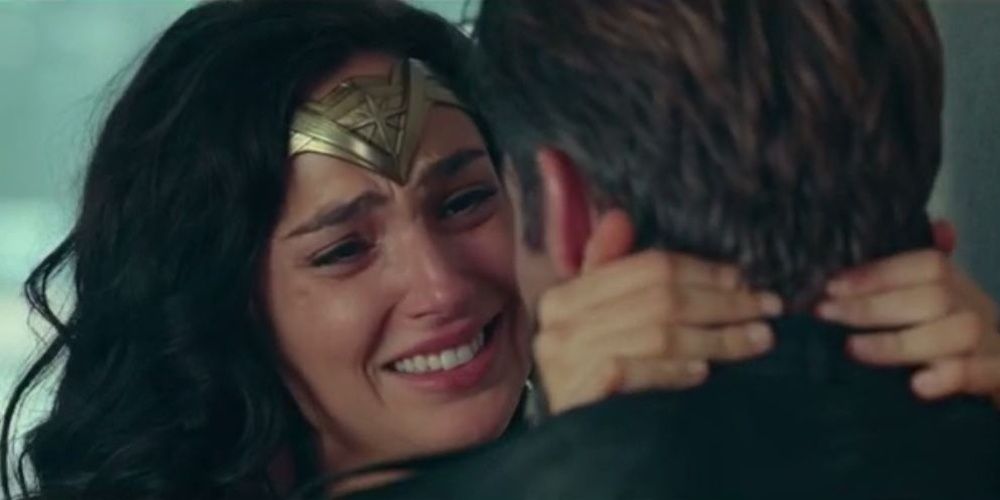 Wonder Woman holds Steve Trevor and cries