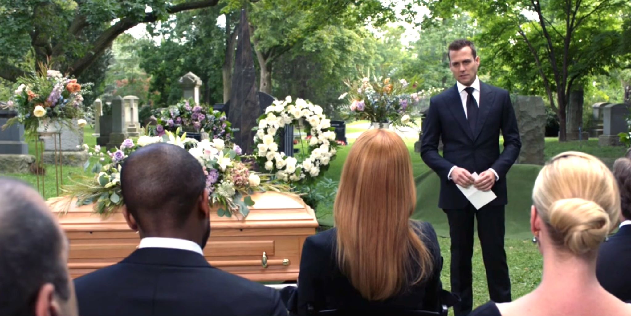 harvey at his mother's funeral