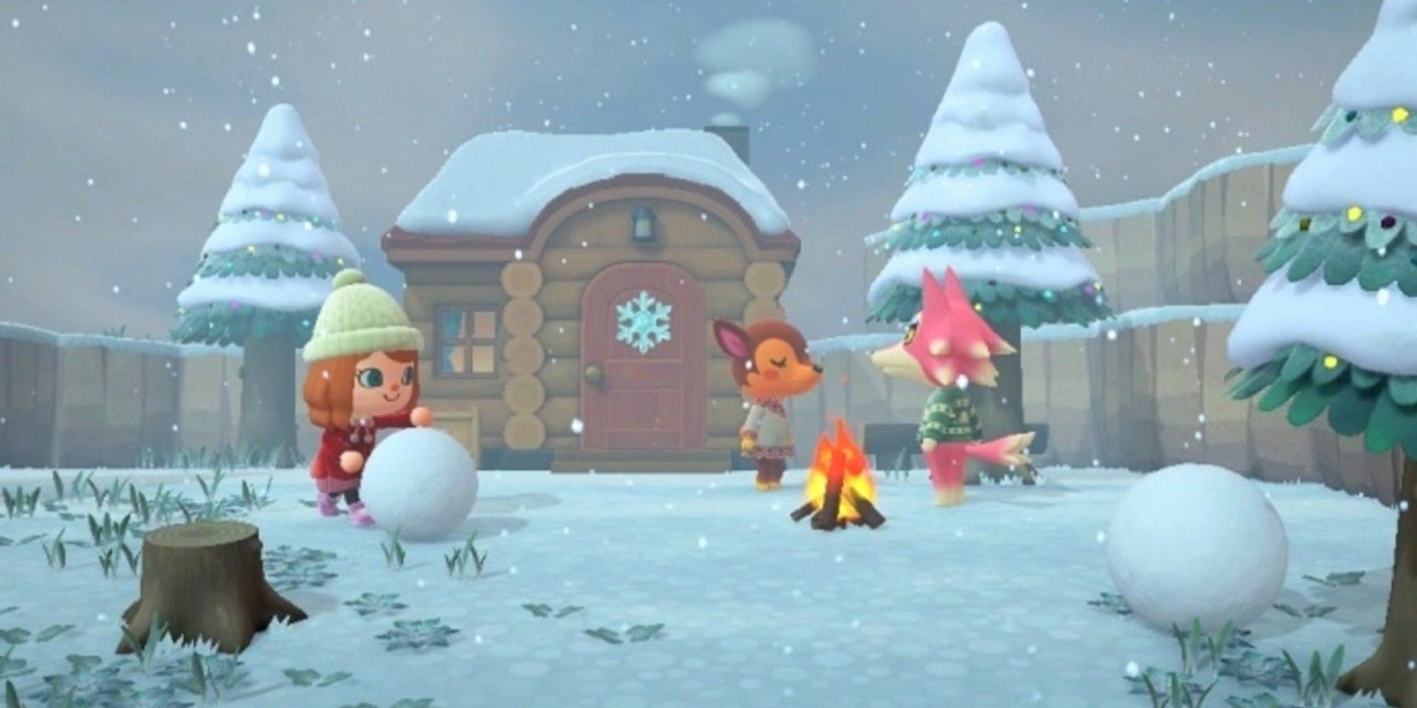 A player rolls a snowball in front of a house while two villagers talk during winter time in Animal Crossing: New Horizons