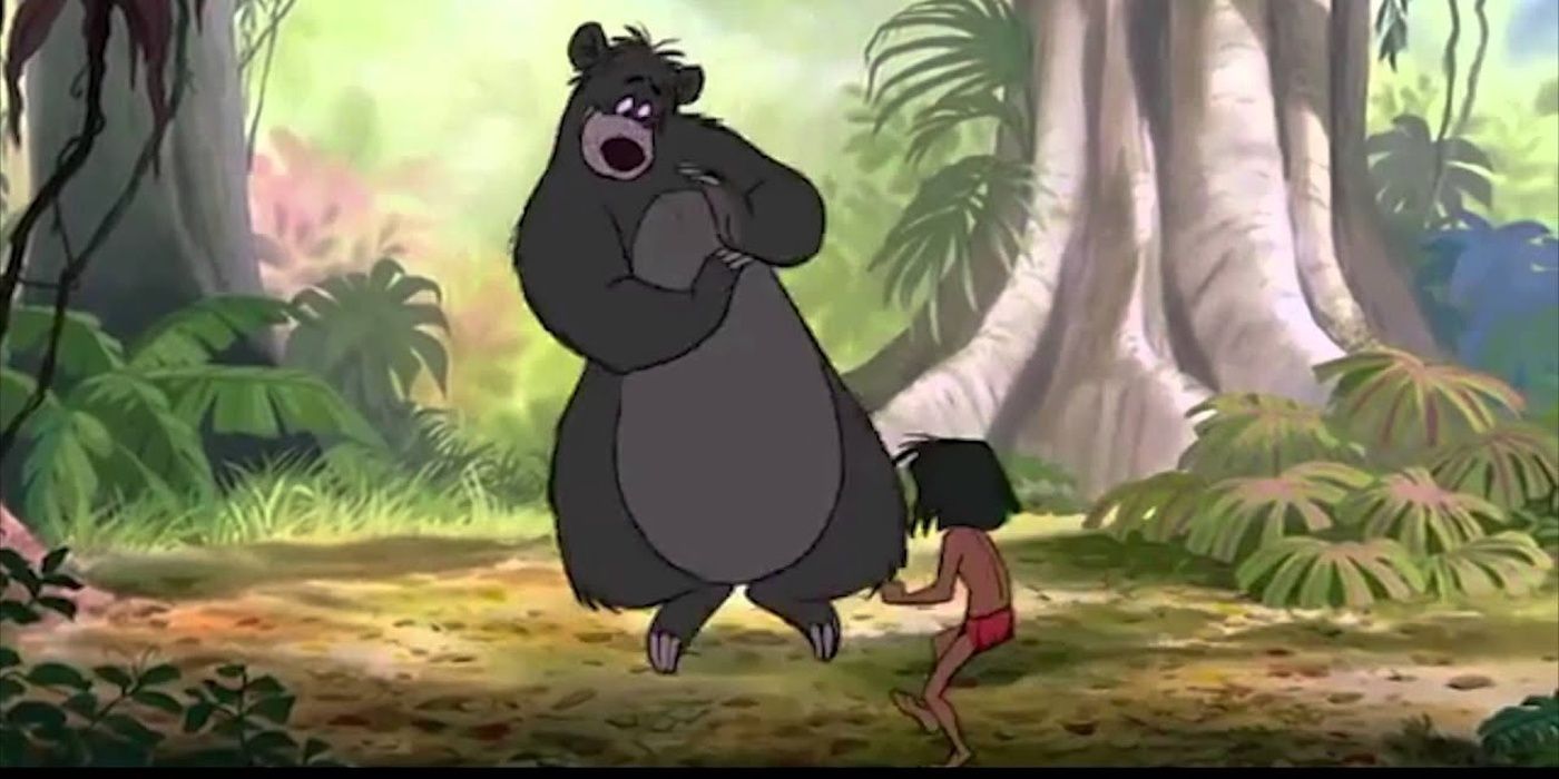 Baloo and Mowgli practice fighting in The Jungle Book