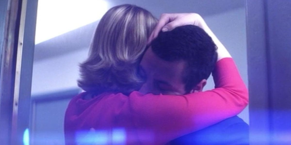 Barry and Lena hug in Punch Drunk Love