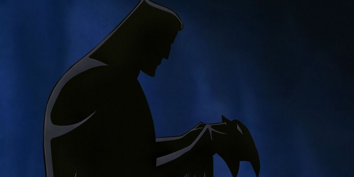 Batman putting on the cape and cowl in Mask of the Phantasm