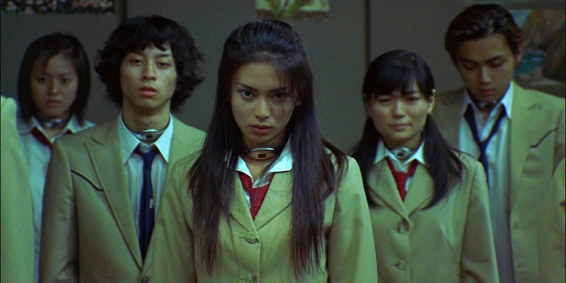 A group of teenagers in school uniforms in Battle Royale