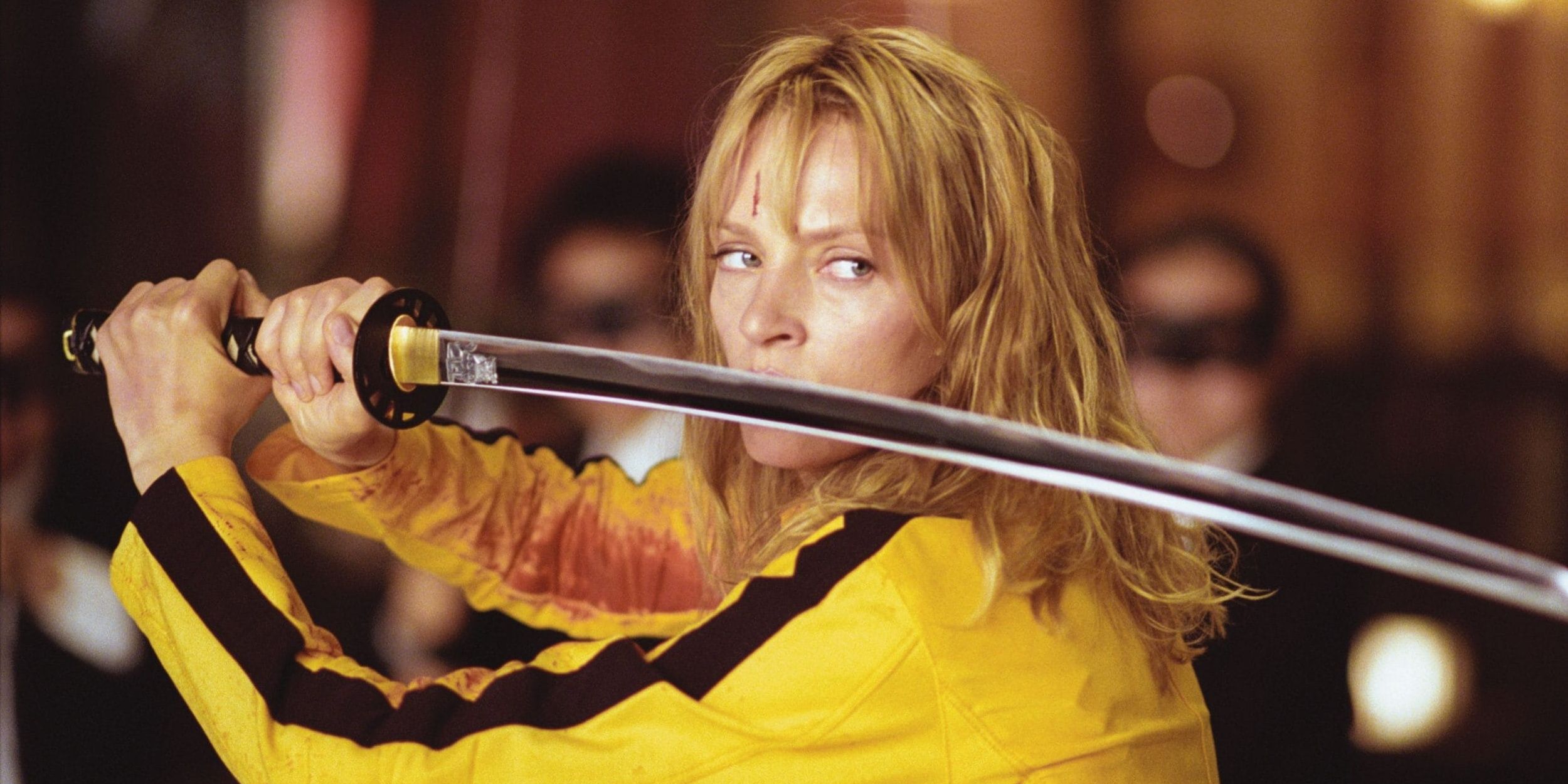 Beatrix Kiddo holding a sword in Kill Bill 