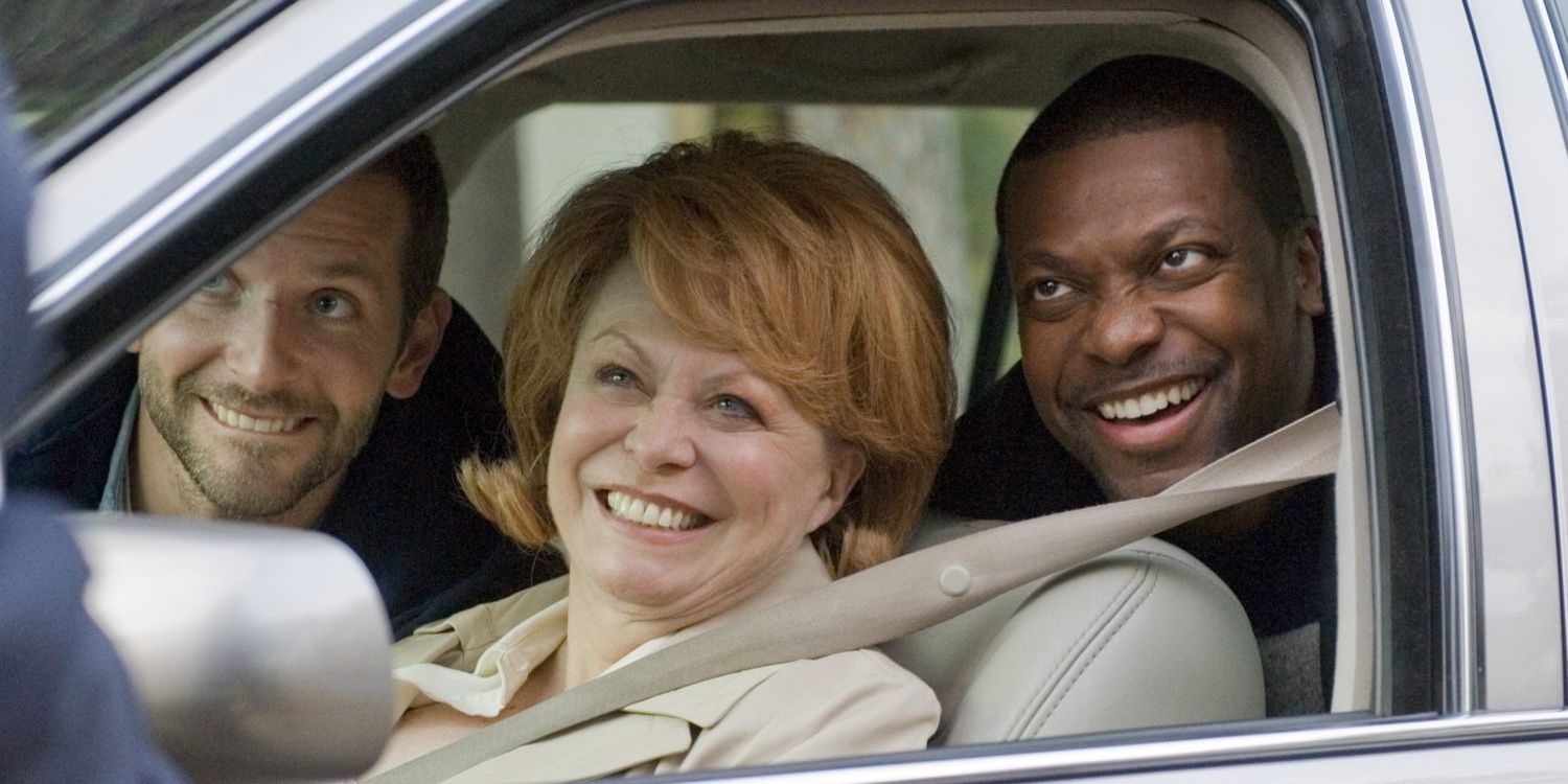 Dolores drives a car and smiles in Silver Linings Playbook