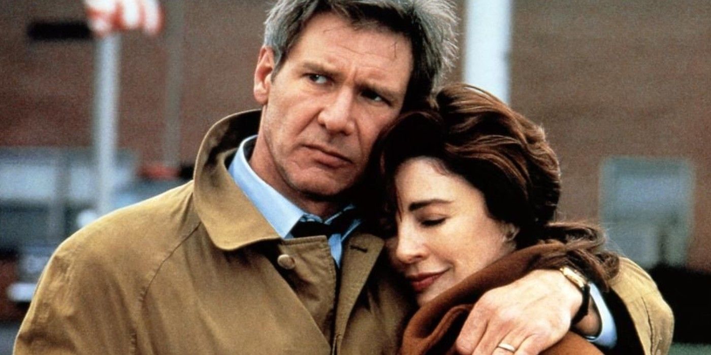 Harrison Ford as Jack Ryan with his arm around Amy Archer in Clear and Present Danger.