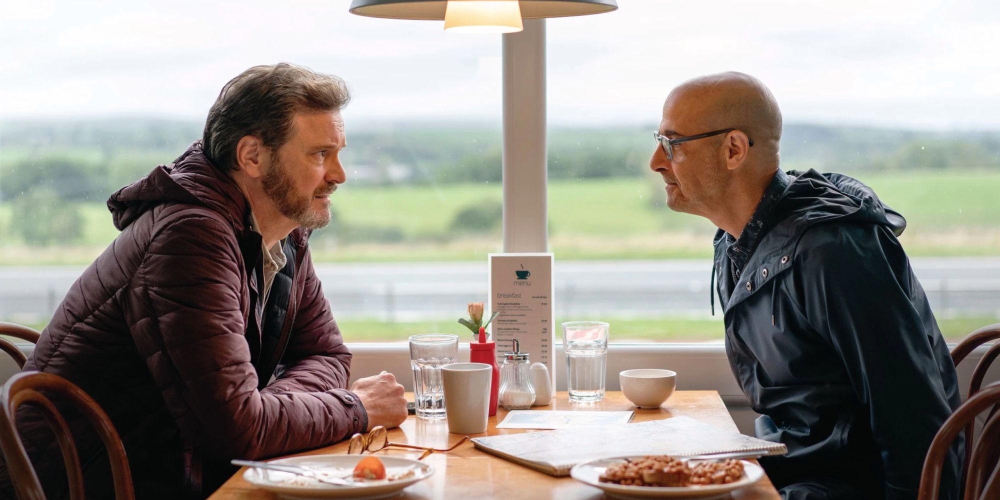 Colin Firth and Stanley Tucci eat lunch at a diner in Supernova.