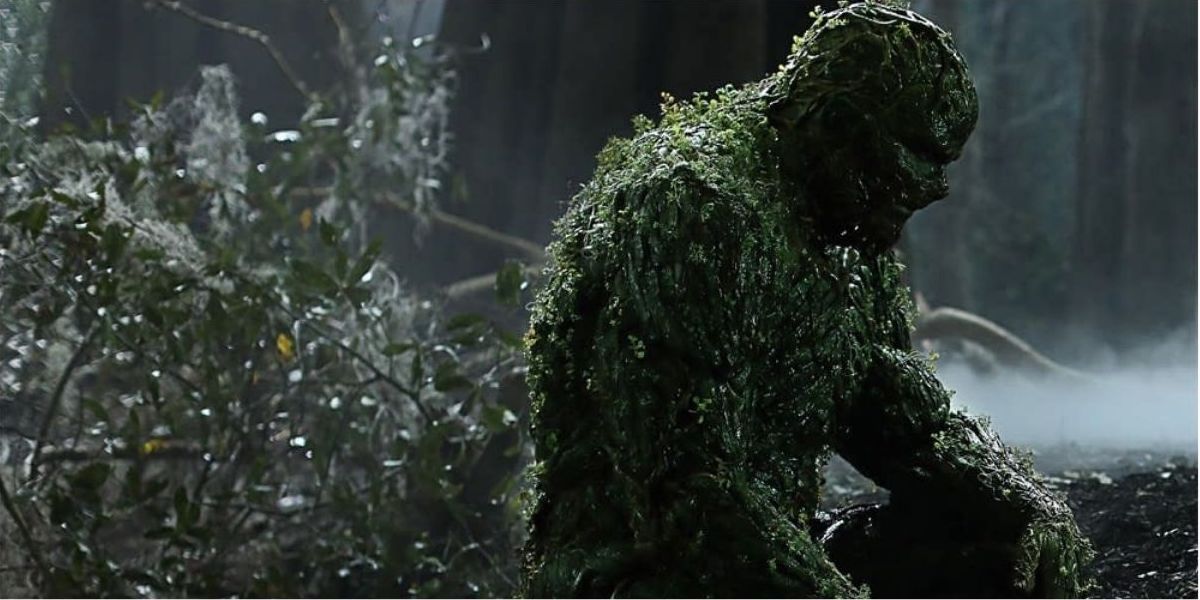 Swamp Thing sitting in the woods