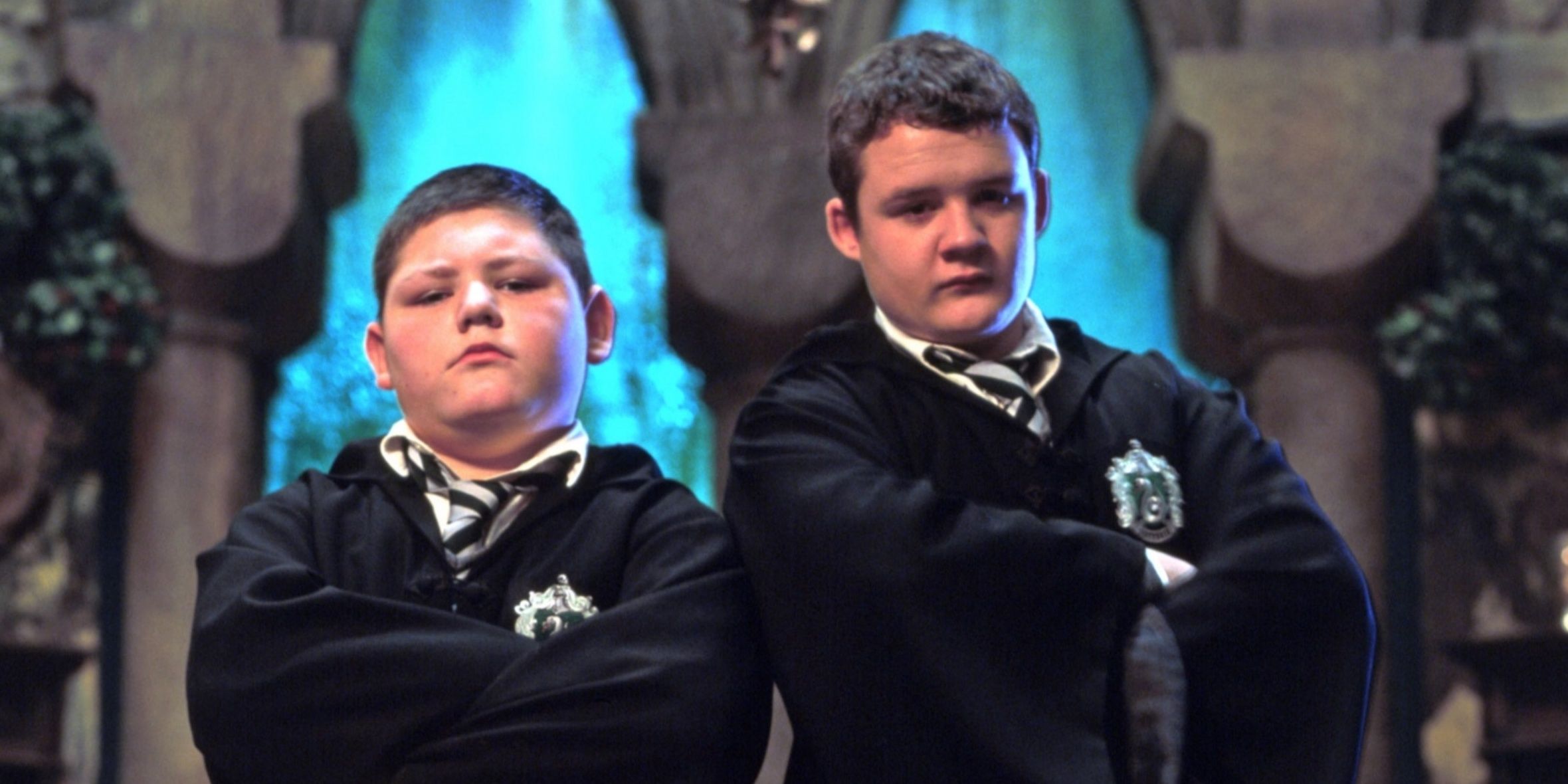 Crabbe and Goyle with their arms crossed in Harry Potter