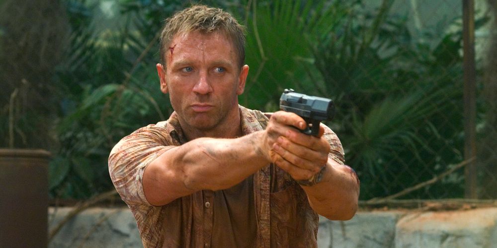 Daniel Craig as James Bond holding a gun in Casino Royale