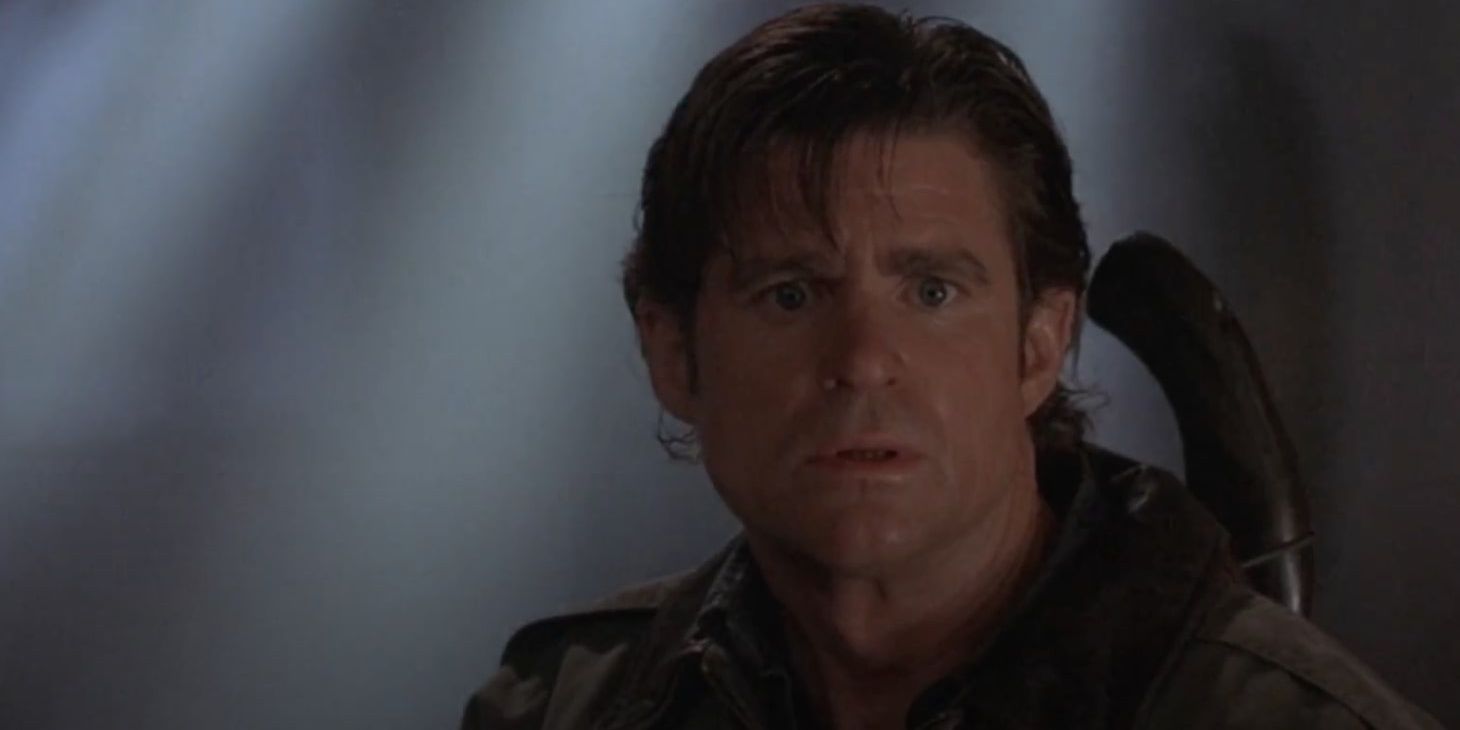 Treat Williams looks into camera in Deep Rising