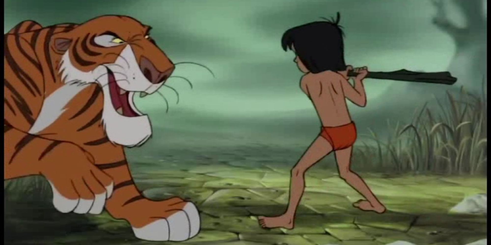 Mowgli tries to fight Shere Khan in The Jungle Book