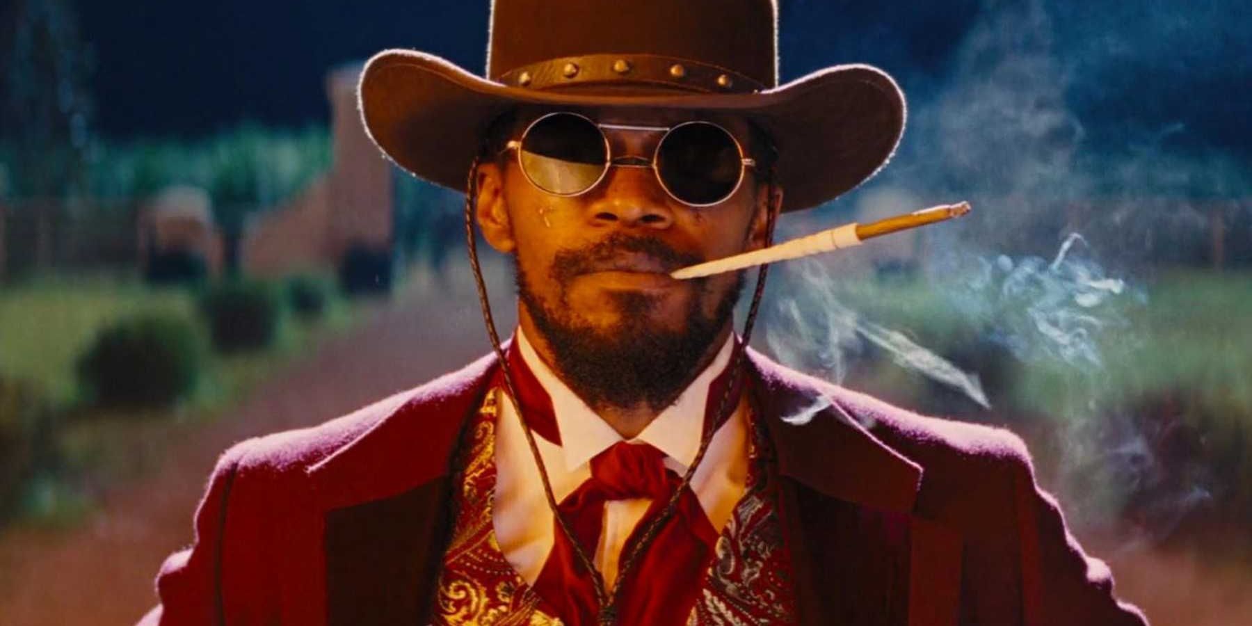 Django wears Calvin Candie’s clothes and smokes his cigar in Django Unchained