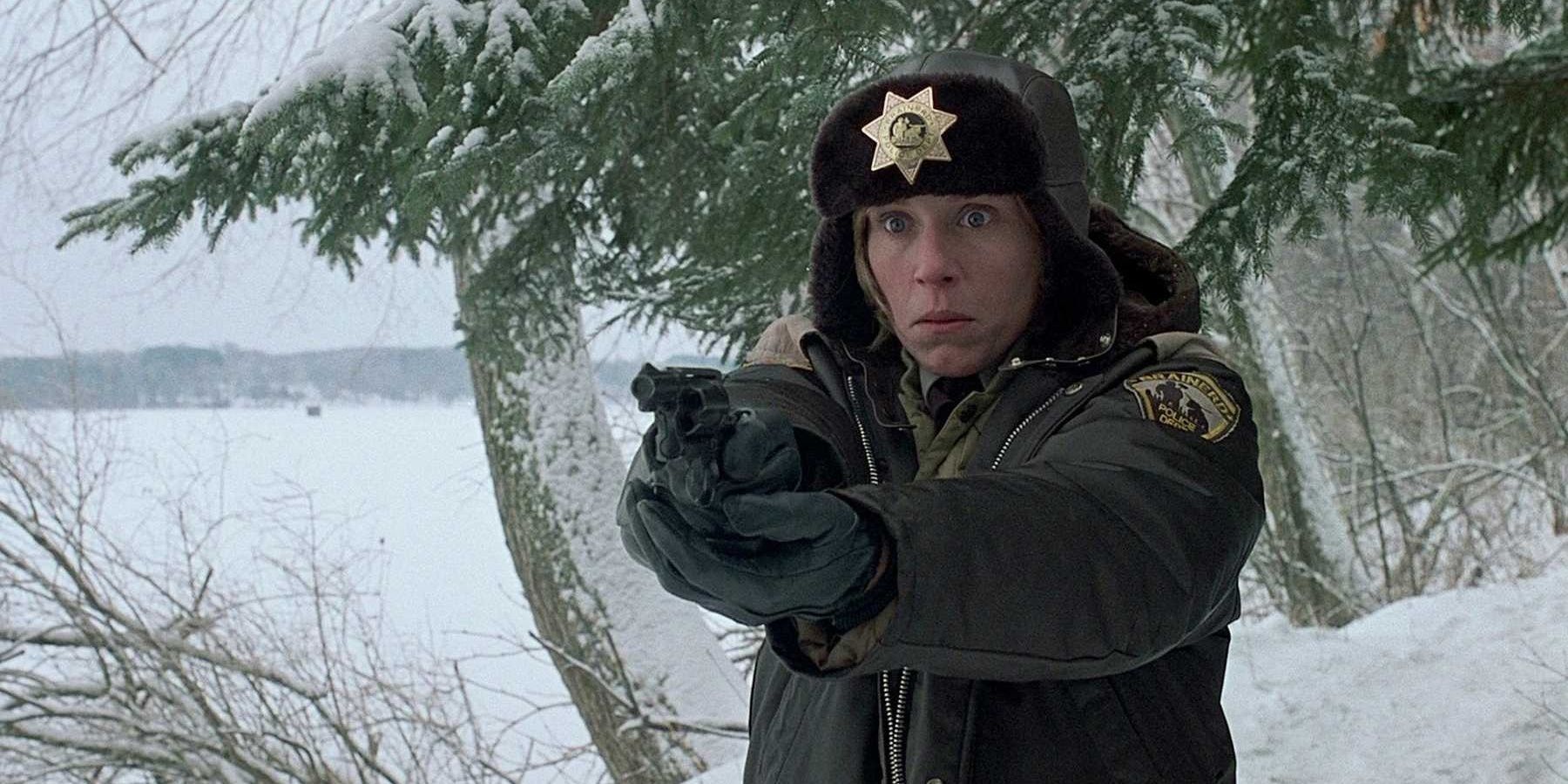 Francis McDormand aims her gin in a snowy field in Fargo.