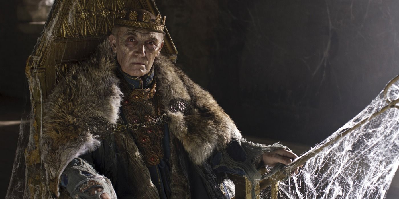 An image of the Fisher King sitting on his old throne in Merlin
