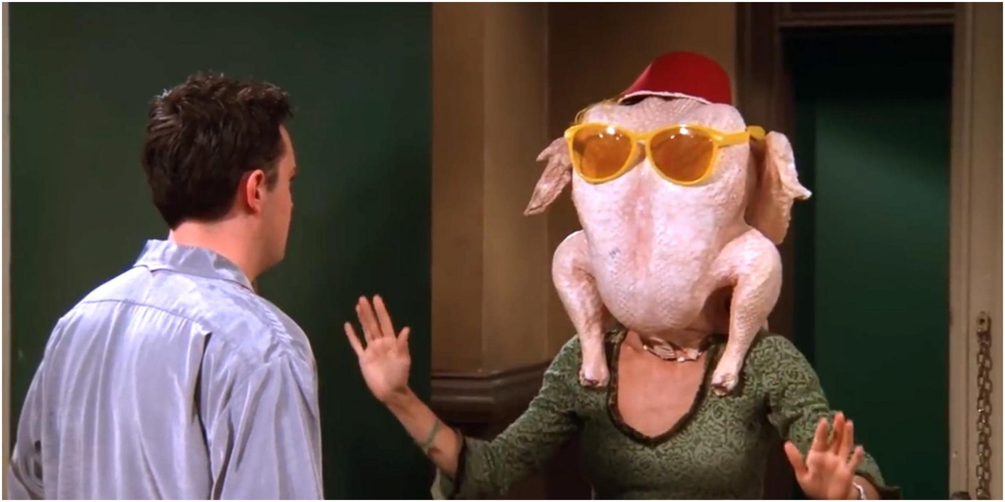 Monica dances with a turkey on her head in Friends