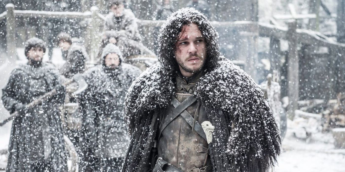 Jon Snow standing in the snow in Game of Thrones