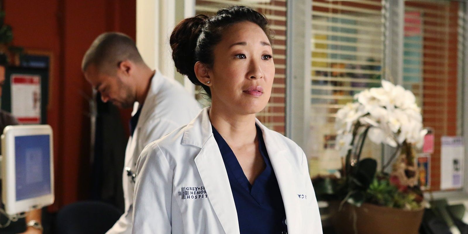 Cristina Yang steps out of the OR after performing surgery on Cris in Grey's Anatomy