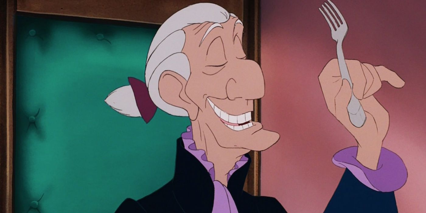 Grimsby smiling while holding a fork in The Little Mermaid