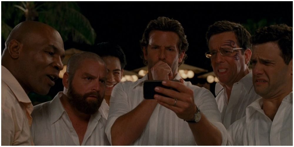 Men Looking At Smartphone