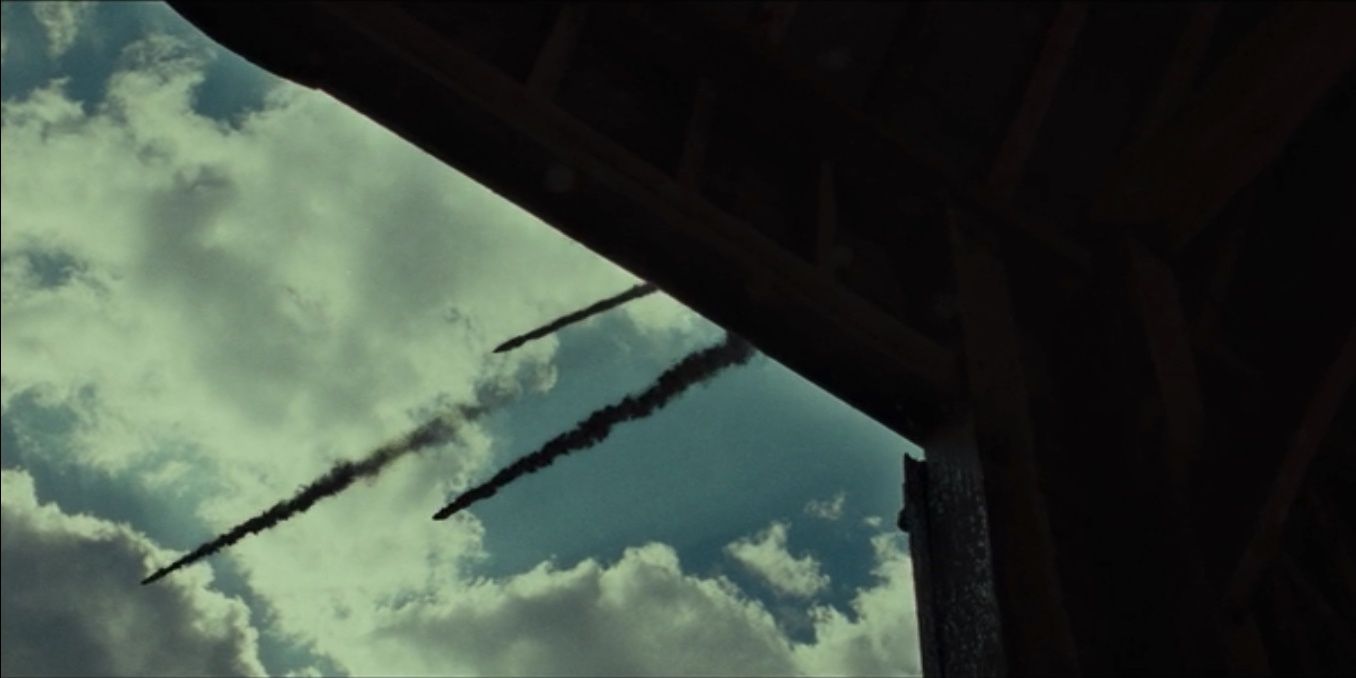 Death Eaters fly across the sky in Harry Potter