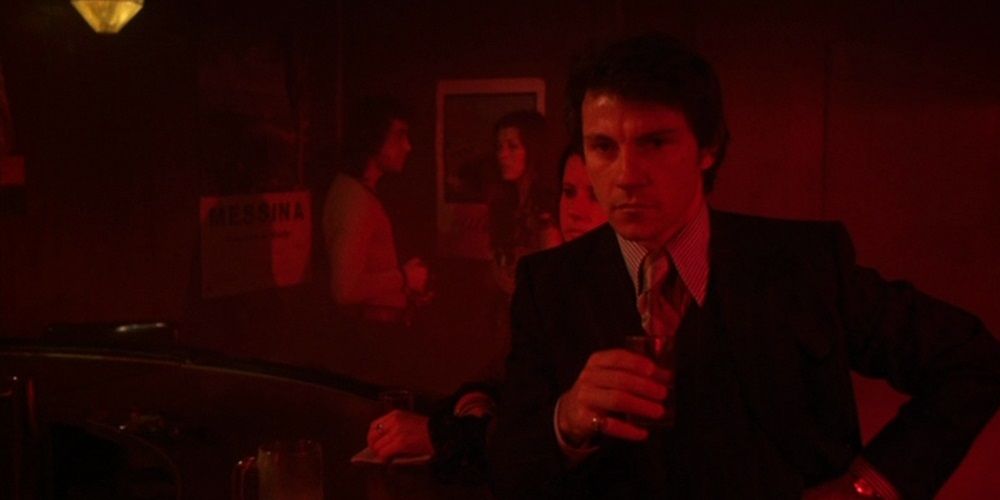 Harvey Keitel drinking in a bar in Mean Streets