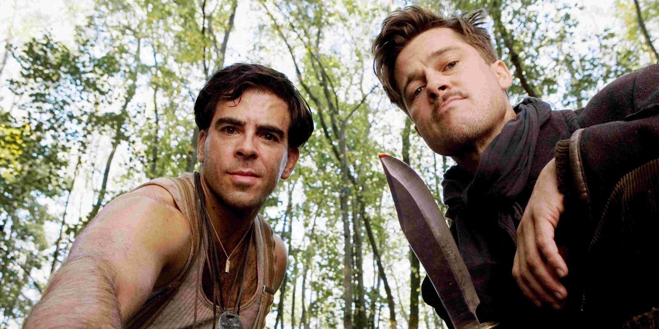 Donny Donowitz and Aldo Raine looking down at someone Inglorious Basterds