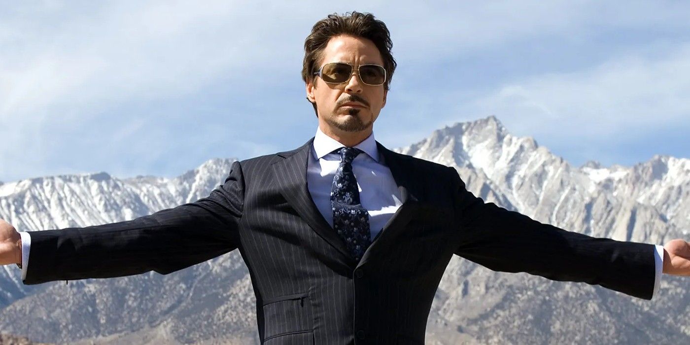 Tony Stark with his arms spread in Iron Man