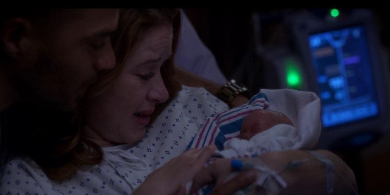 April holds her baby