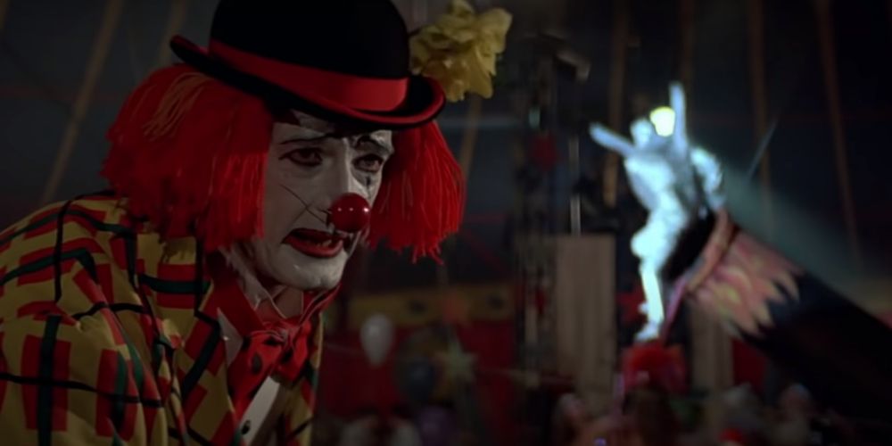 Roger Moore dressed as a clown in Octopussy