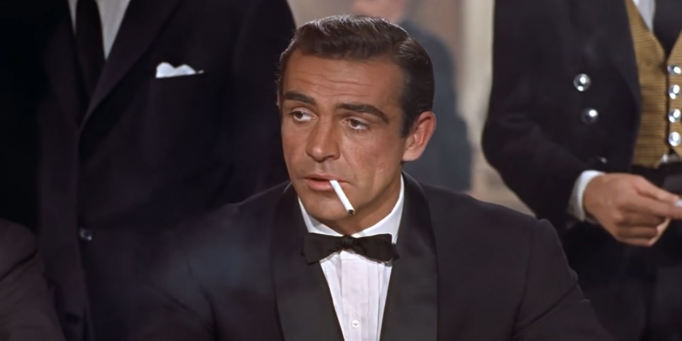 James Bond lights a cigarette at a poker table in Dr No.