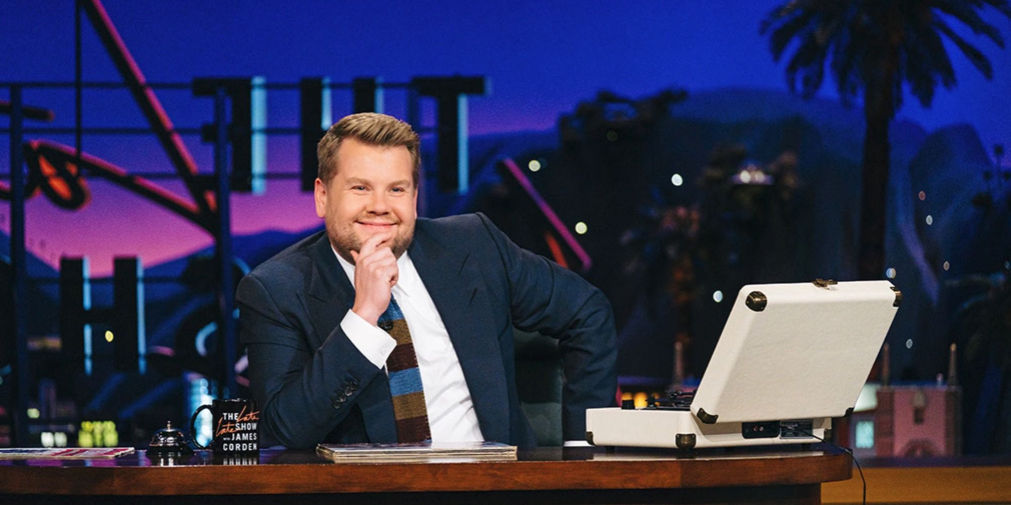 James Corden with a white briefcase in The Late Late Show