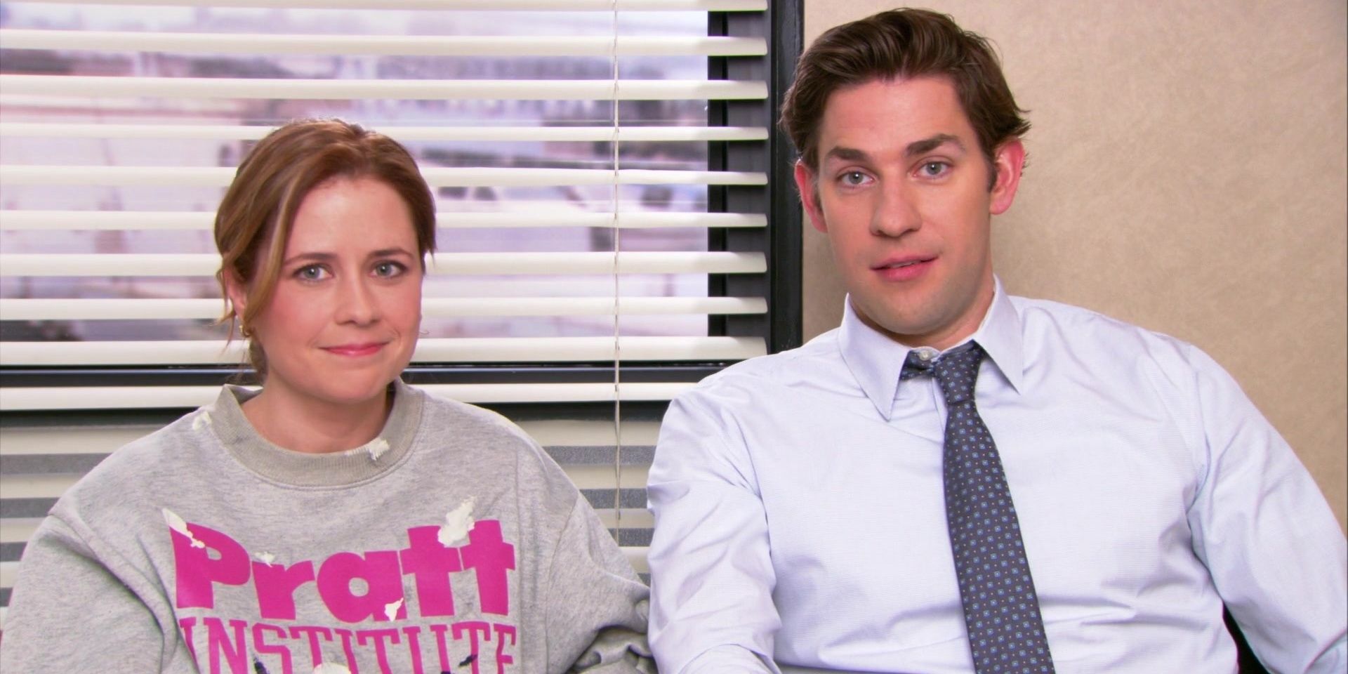 Pam and Jim sitting next to each other in talking head on The Office