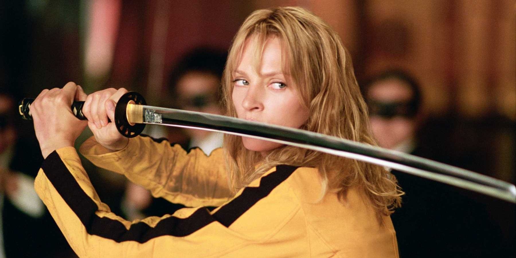 The Bride holds up her katana in combat in Kill Bill