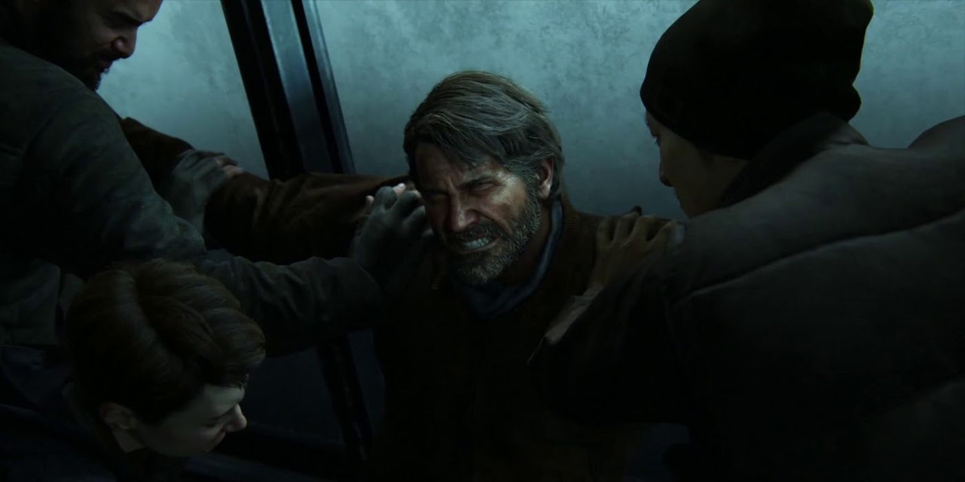 Several men restraining Joel in The Last of Us 2