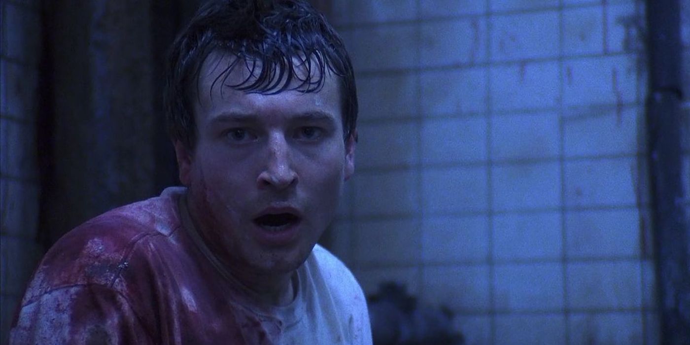 Leigh Whannell as Adam in Saw