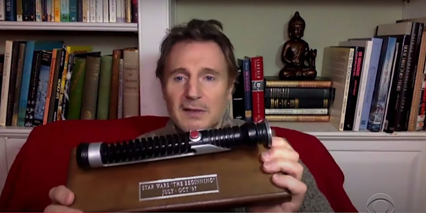 Liam Neeson Shows Off Qui-Gon Jinn’s Lightsaber in New Video With James Corden