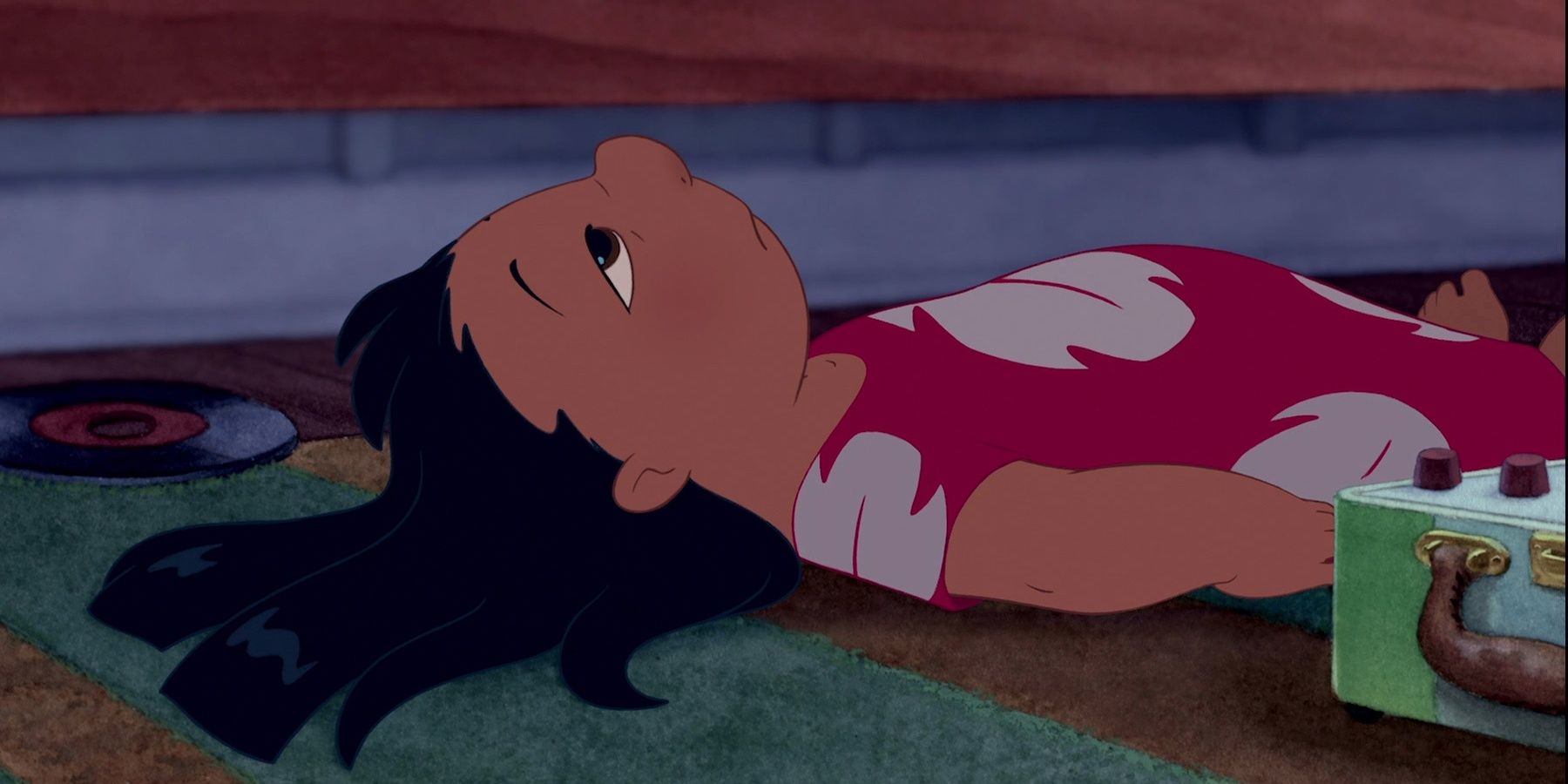 Lilo laying down listening to a record in Lilo & Stitch 