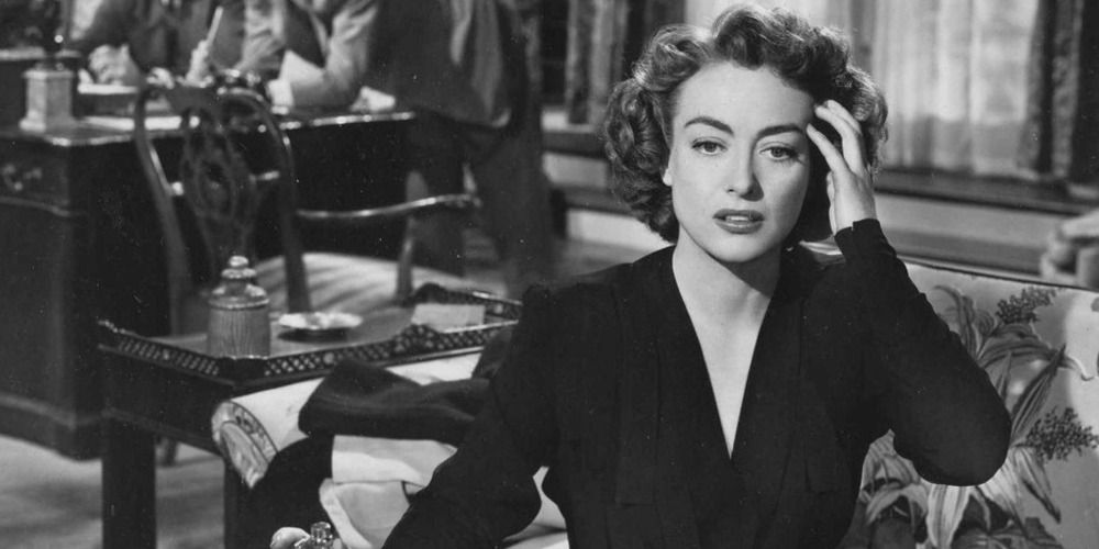 Joan Crawford's character Louise Howell looking distressed In Possessed