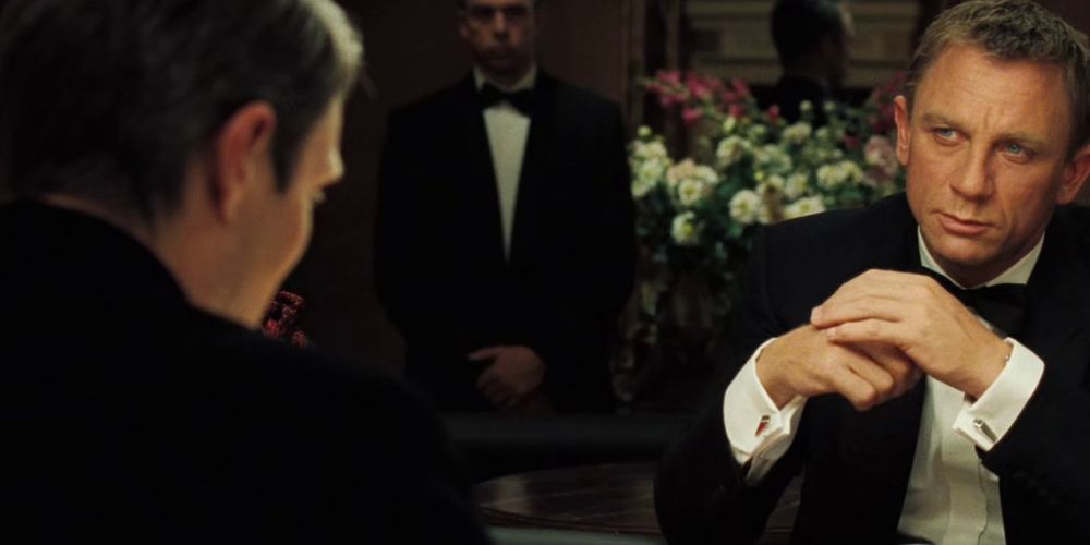 Mads Mikkelsen as Le Chiffre and Daniel Craig and James Bond in Casino Royale