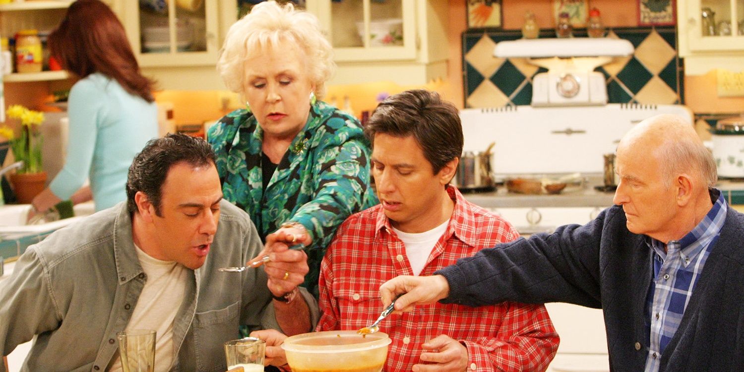 Marie Barone serving food to Ray Robert and Frank in Everybody loves Raymond