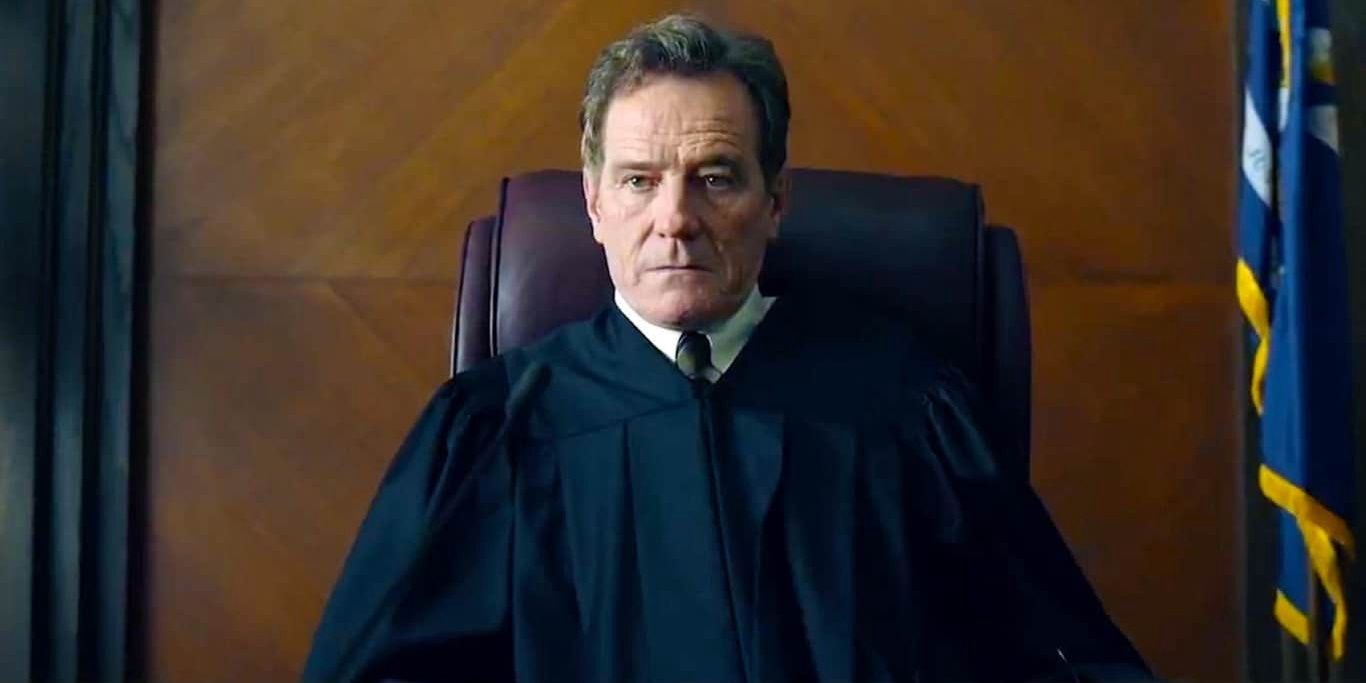 Bryan Cranston as Michael sitting in a courtroom in Your Honor